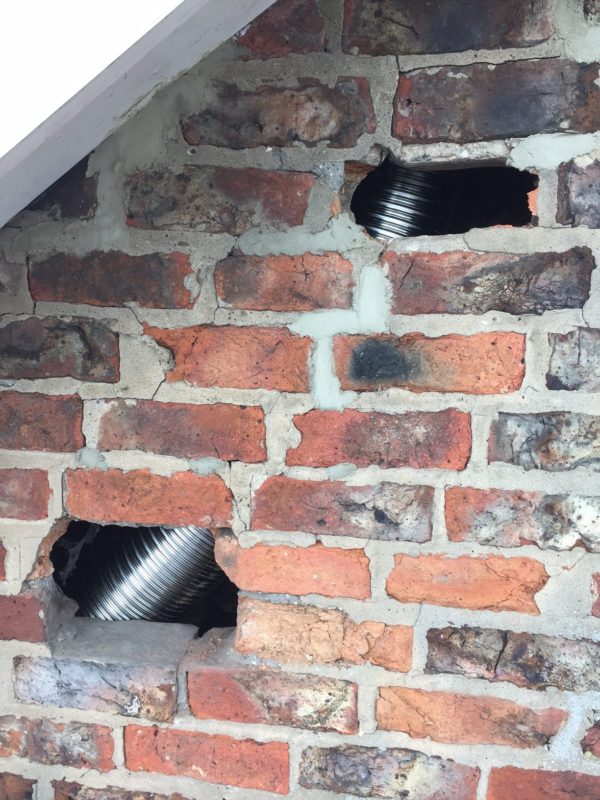 A difficult liner install - we had to break into the gable wall in order to follow the chimney route